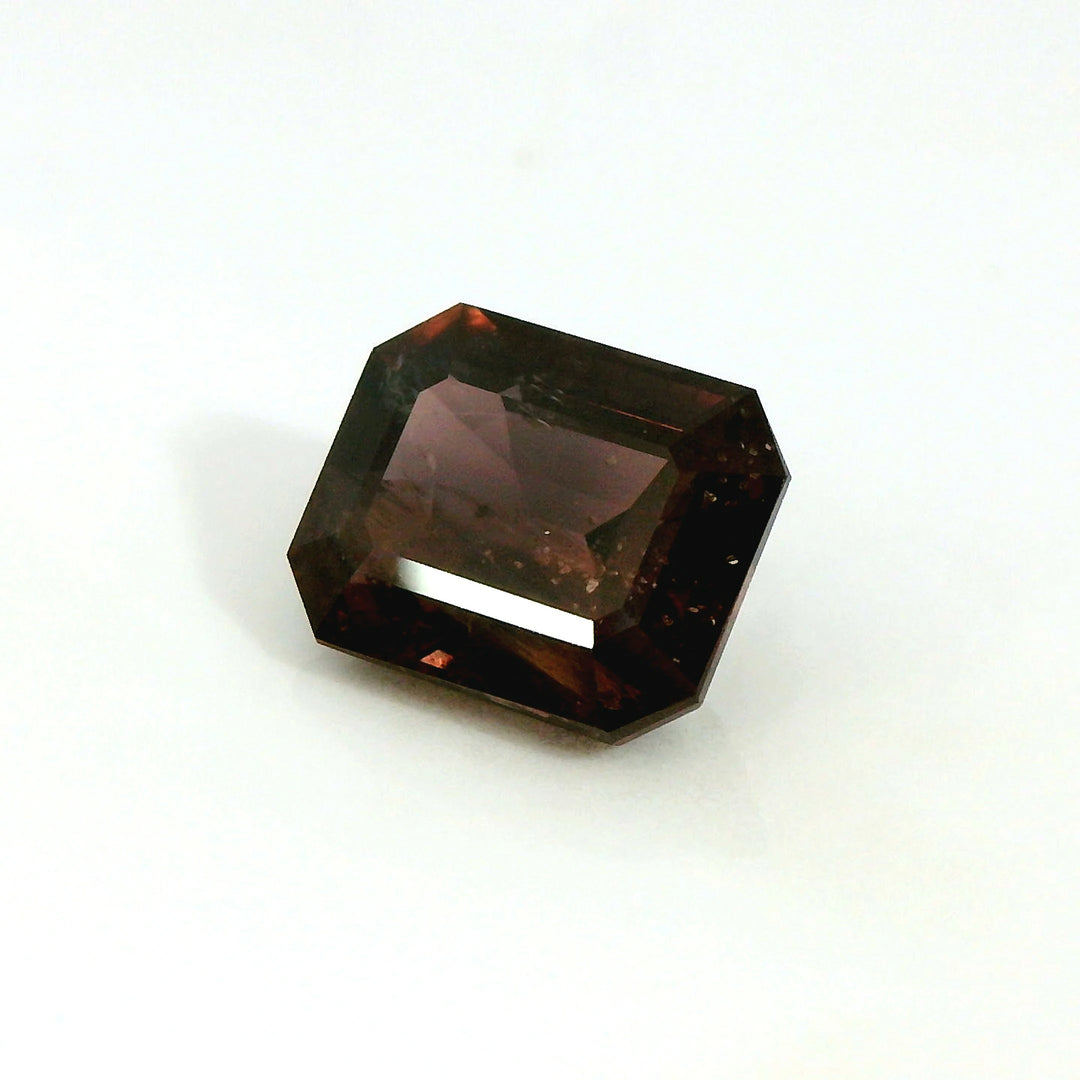 Elegant 3.79ct Emerald Cut Red-Brown Sapphire