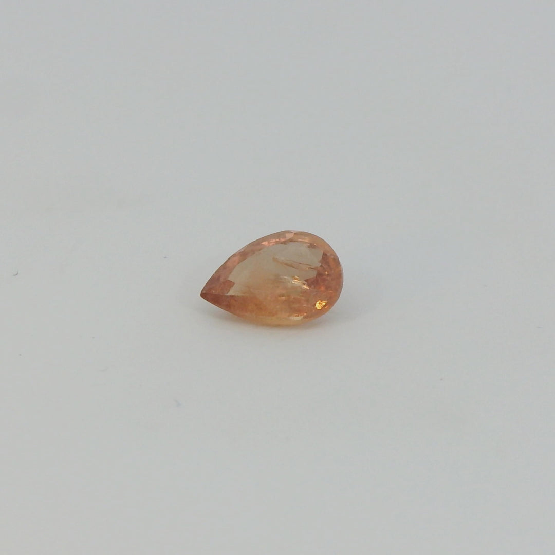 0.72ct Pear Cut Red-Orange Sapphire